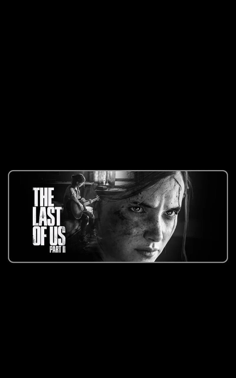 mousepads - Promotional poster for 'The Last of Us Part II' with a close-up of a character's face.