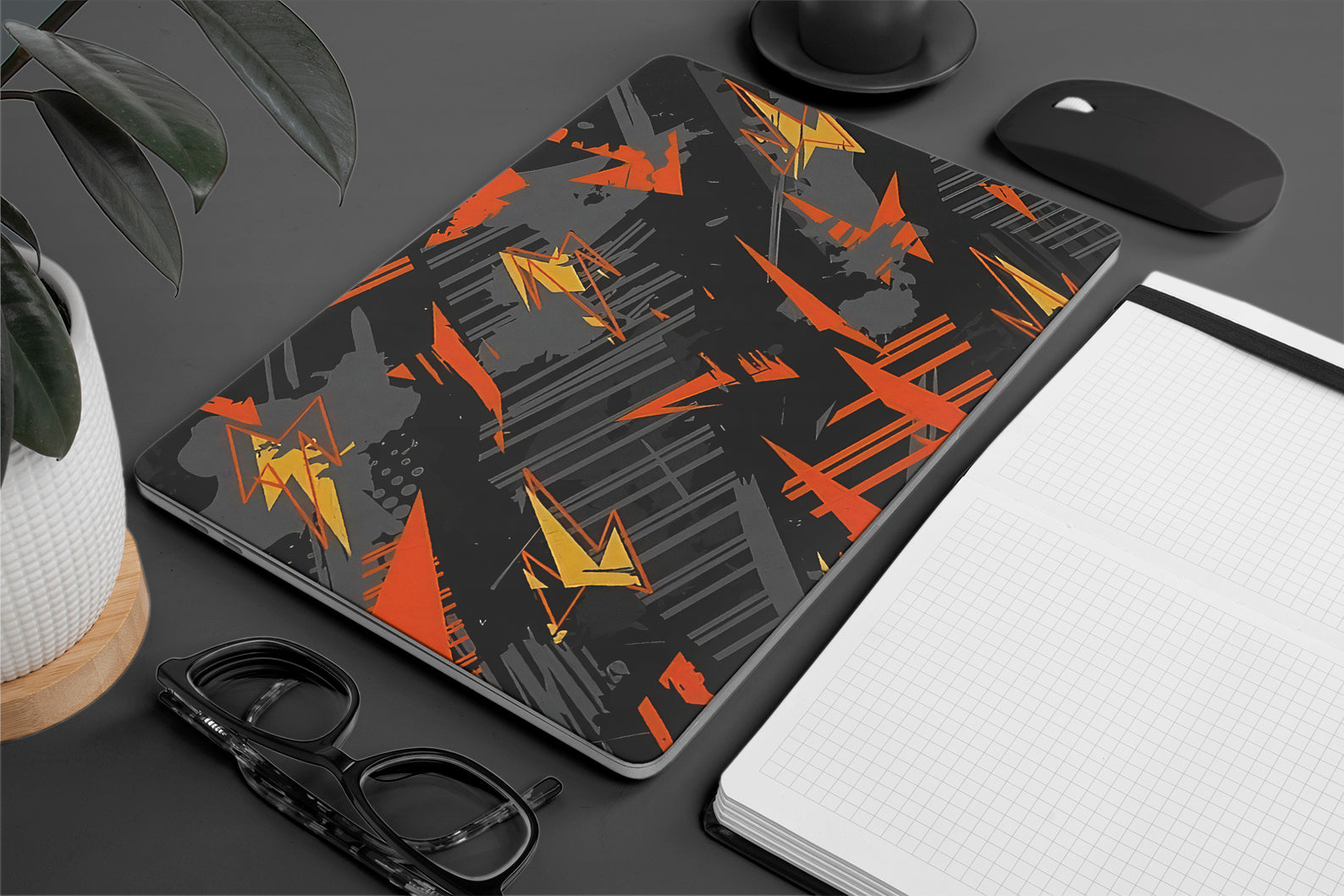 orange and black abstract pattern laptop skin