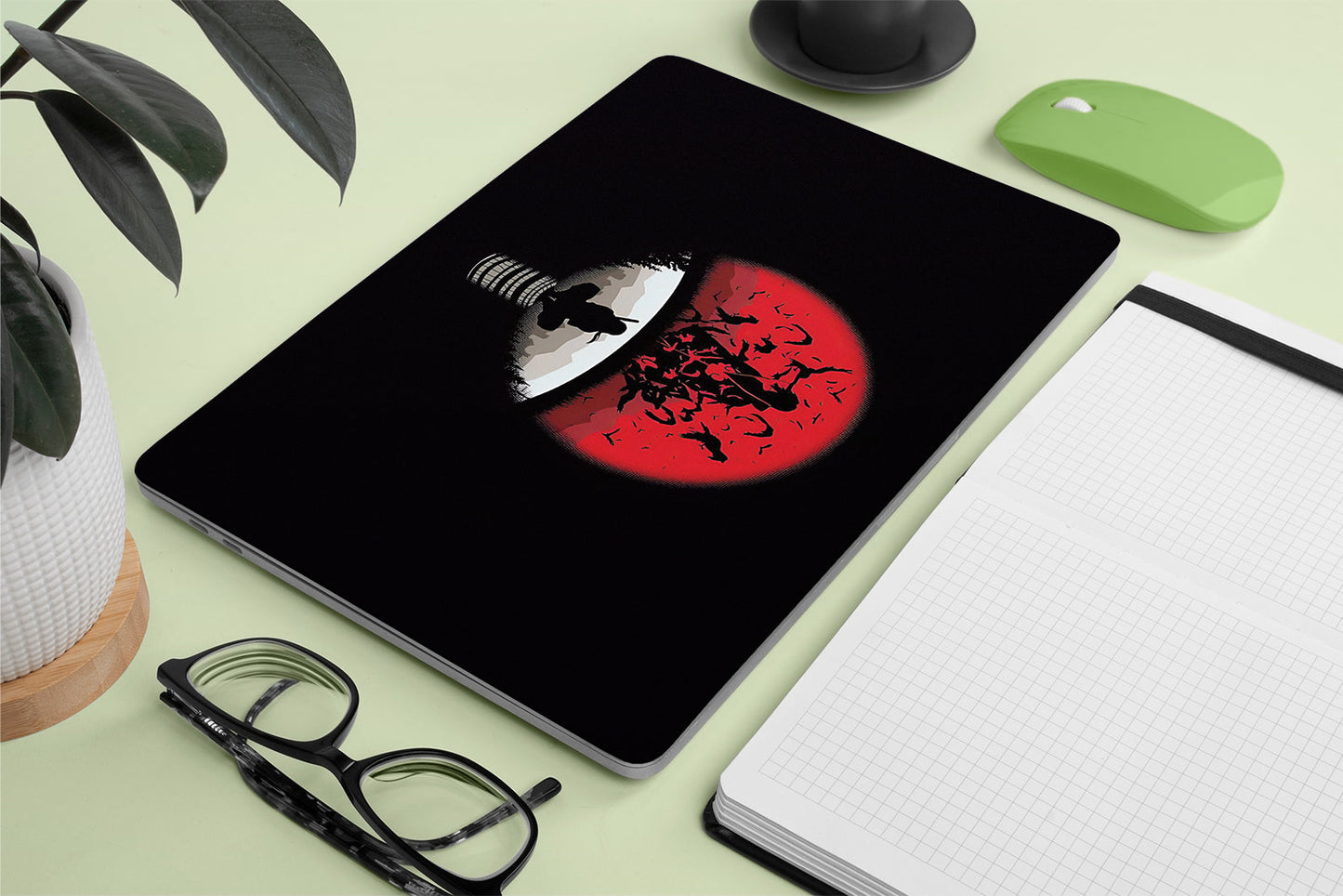 macbook skin with naruto uchiha clan logo