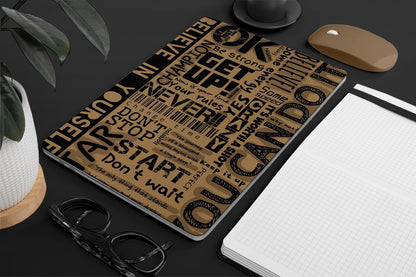 Laptop skin - a motivational text design on a brown background