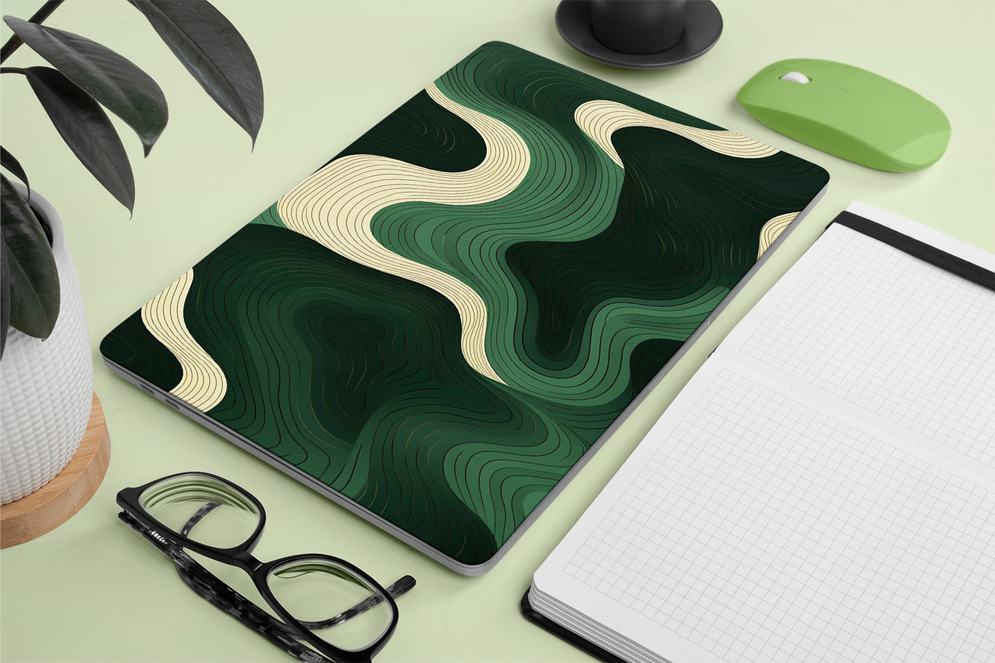 Macbook skin with green swirls on macbook 