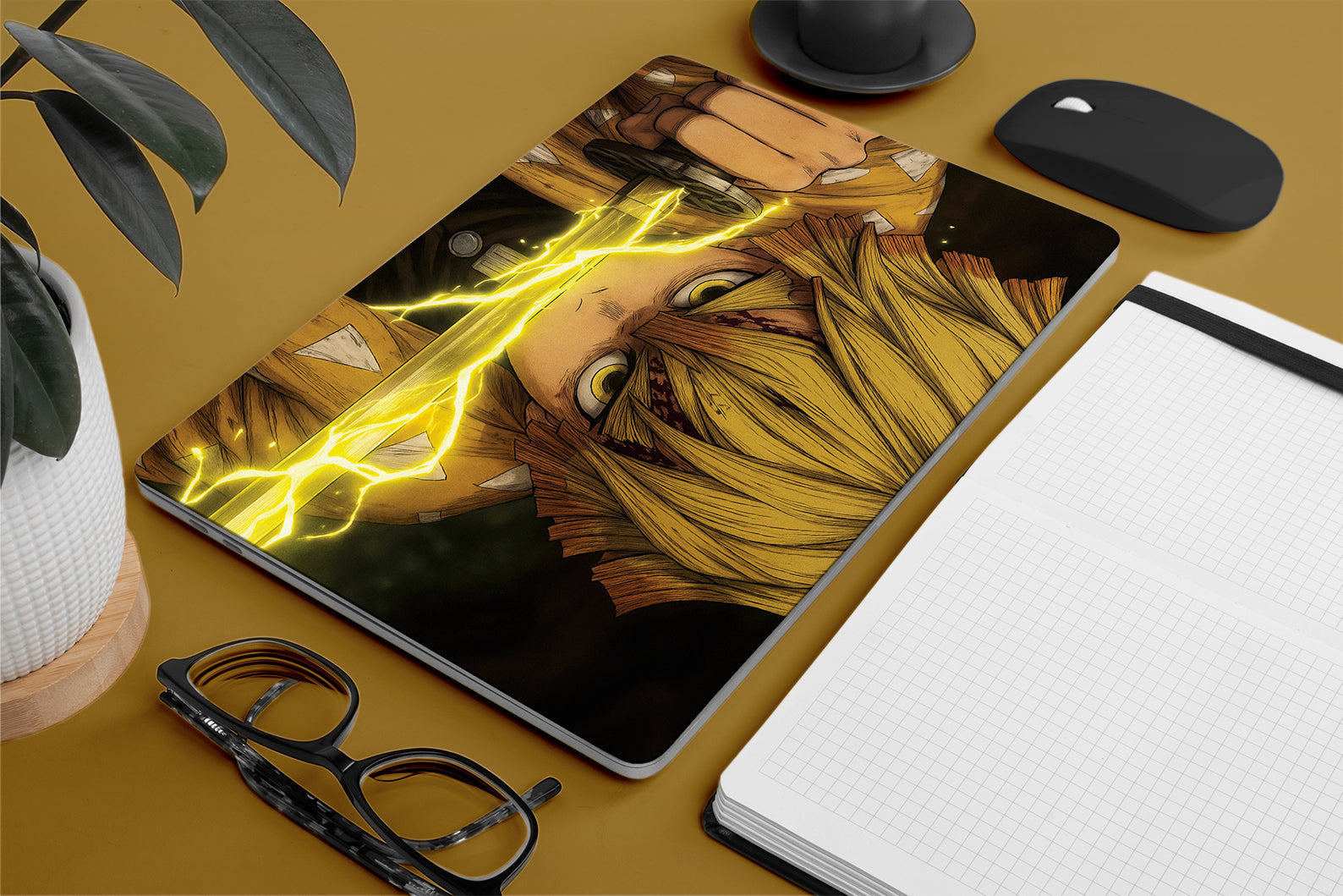 Laptop skin with demon slayer zenitsu design on