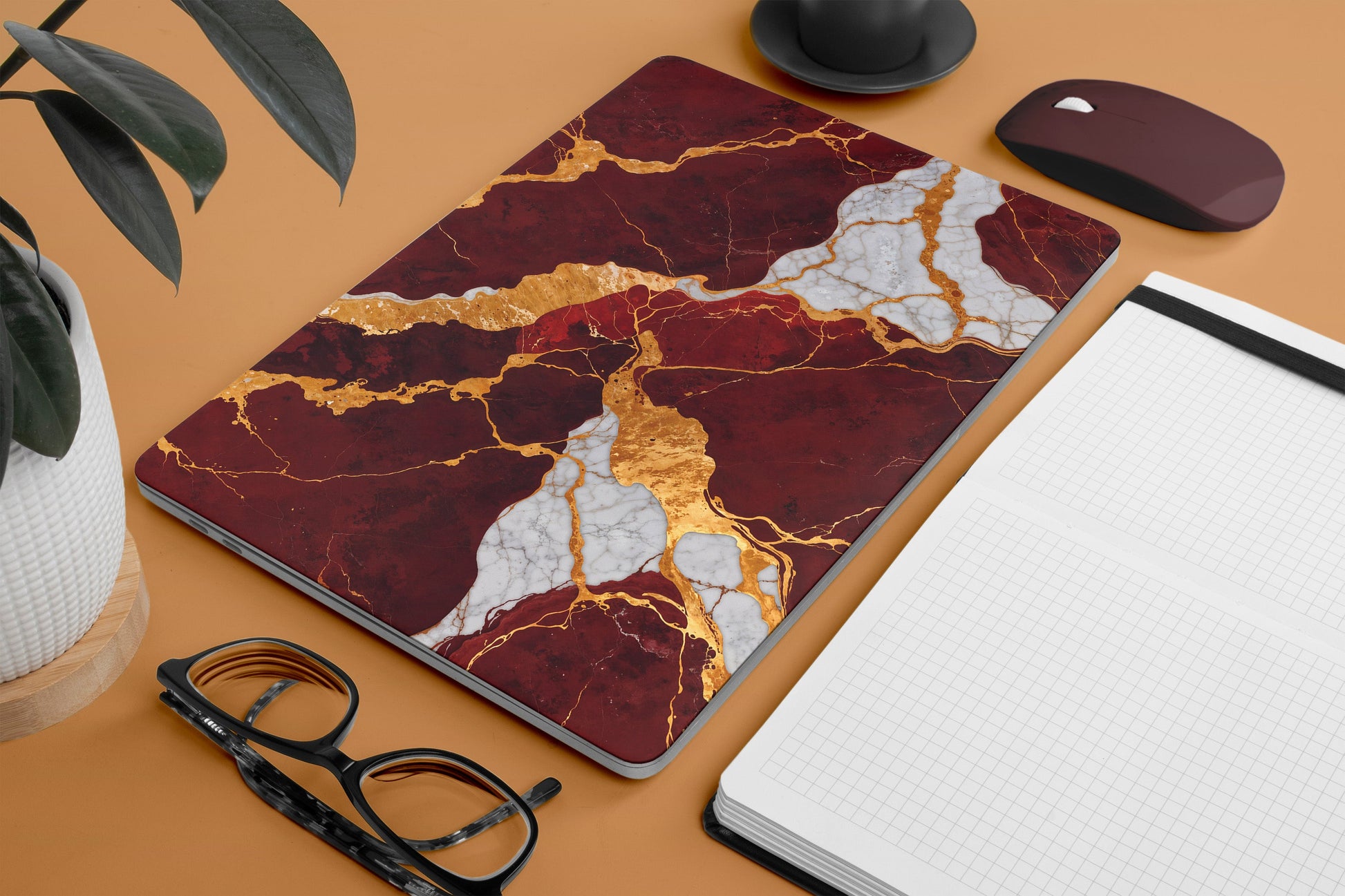 red marble textured laptop skin