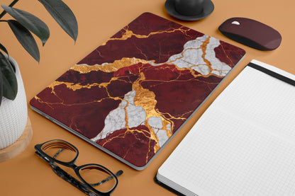 red marble textured laptop skin