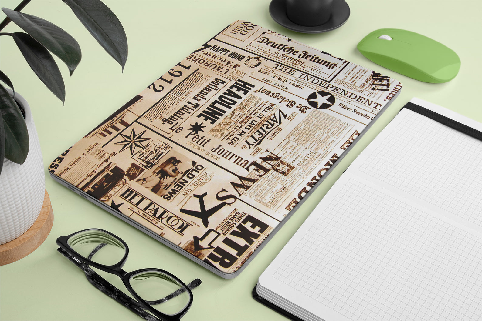 laptop skin with vintage newspaper design