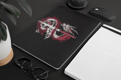 Macbook Skin - a dragon and sword design on a black background