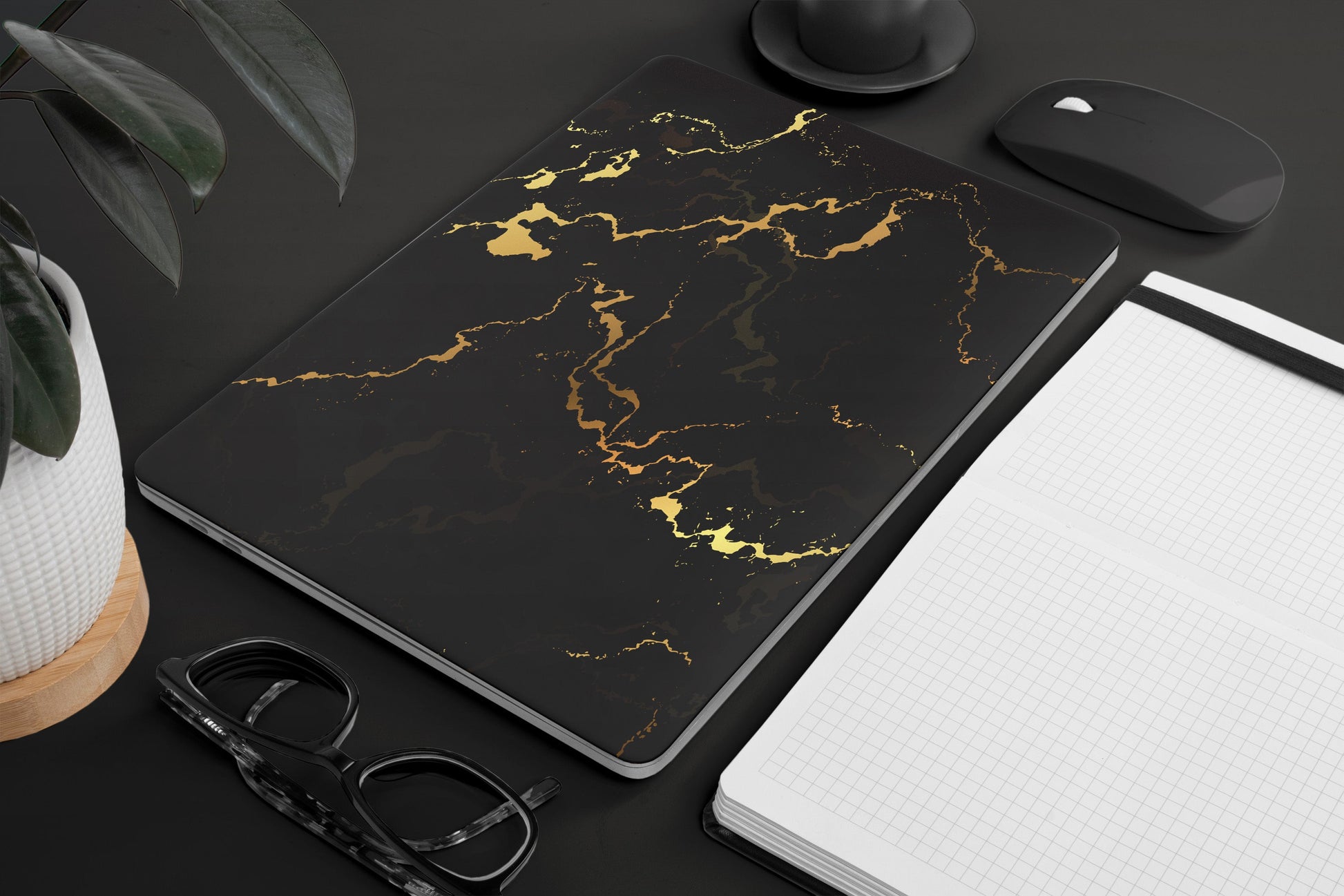 Laptop skins - black and gold marble design on a black background