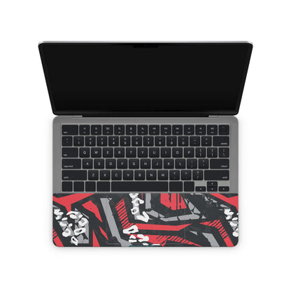 laptop skin with red abstact pattern design on touchpad area