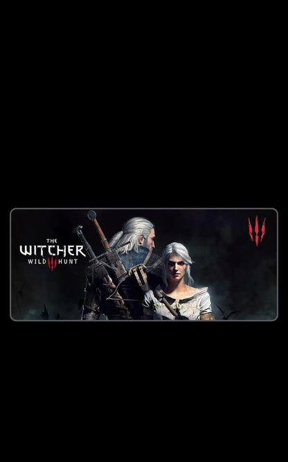 mousepad - Promotional graphic for 'The Witcher: Wild Hunt' with two characters and the game's logo.
