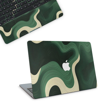 Macbook skin with green swirls on macbook top