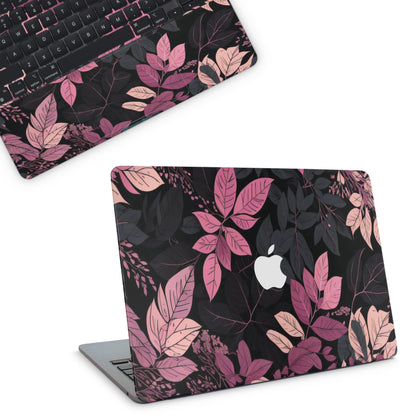 Laptop with a floral design skin on a white background
