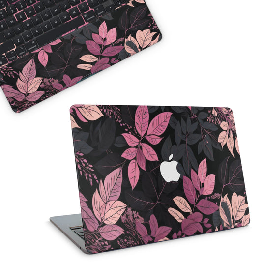Laptop with a floral design skin on a white background