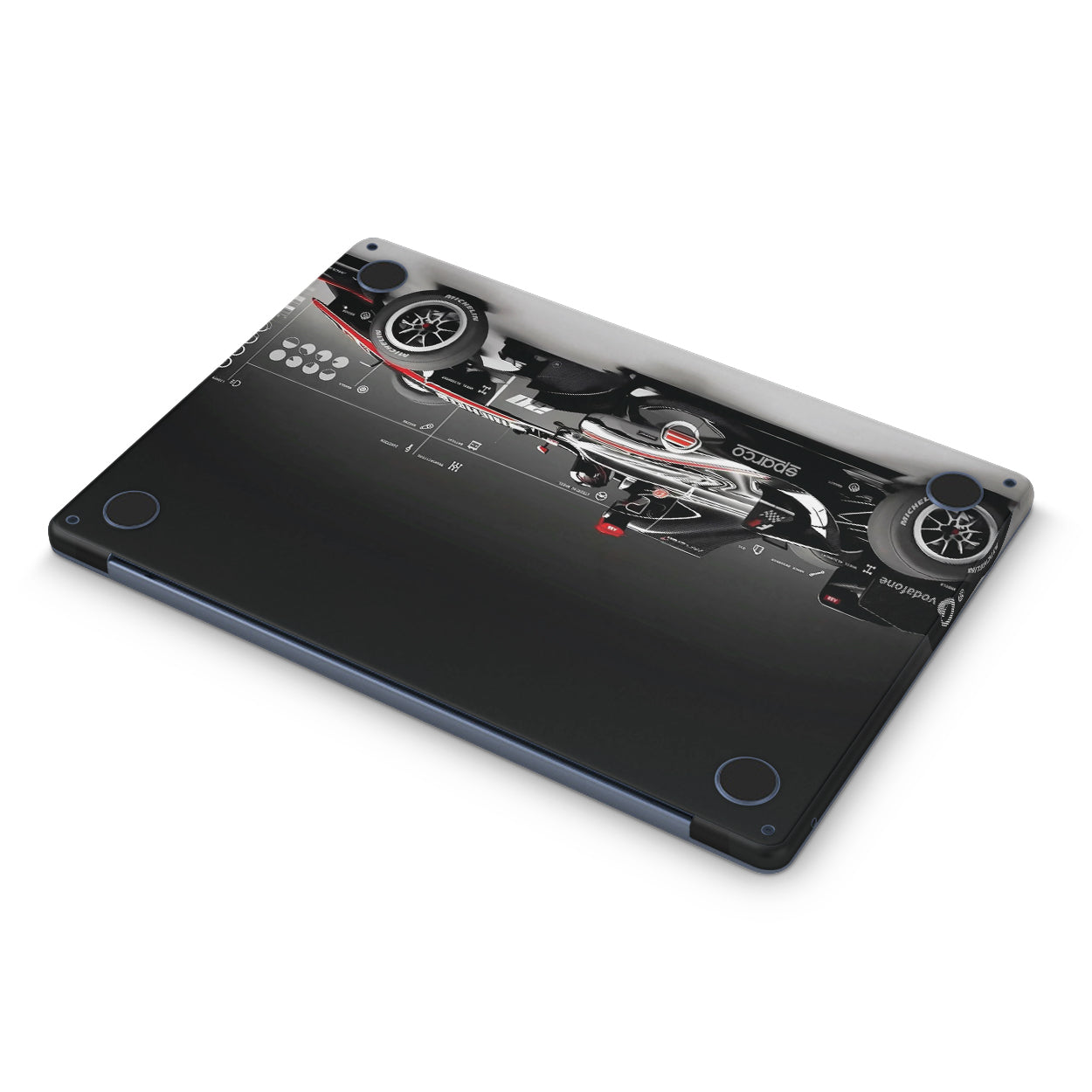 Macbook skin with formula 1 car design on bottom