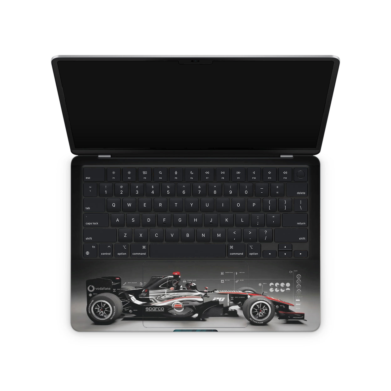 Macbook skin with formula 1 car design on keyboard area