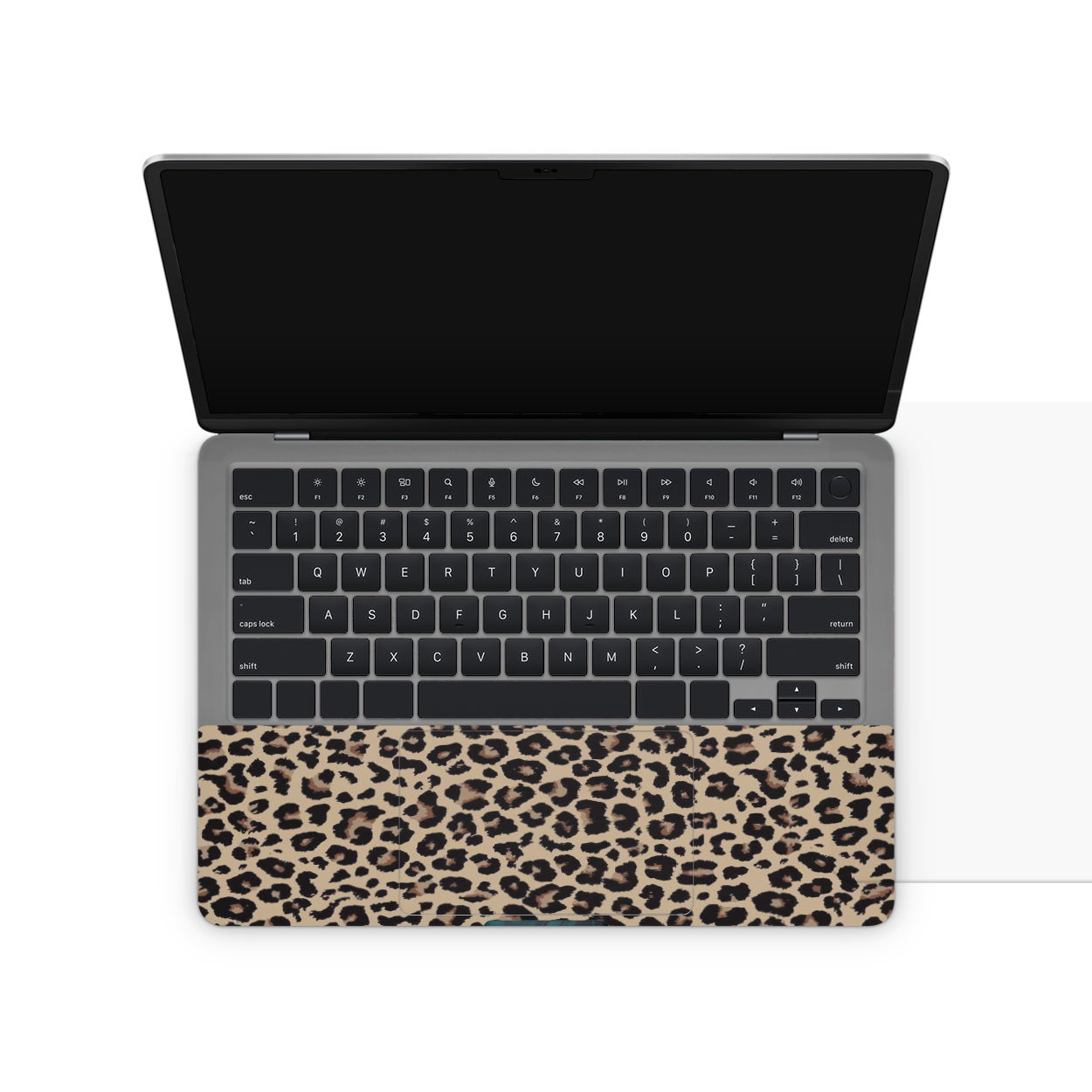 laptop skin with a leopard print design on keyboard