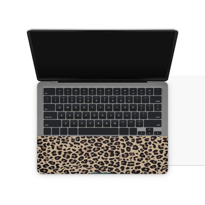 laptop skin with a leopard print design on keyboard