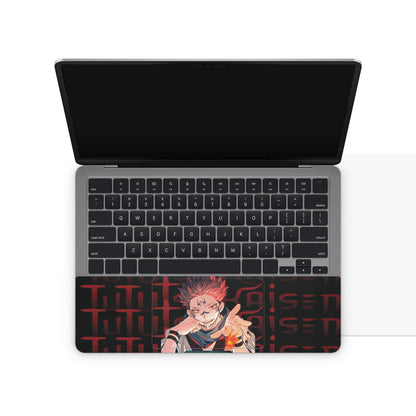 Laptop skin with jujutsu kaisen sukuna on the touchpad area