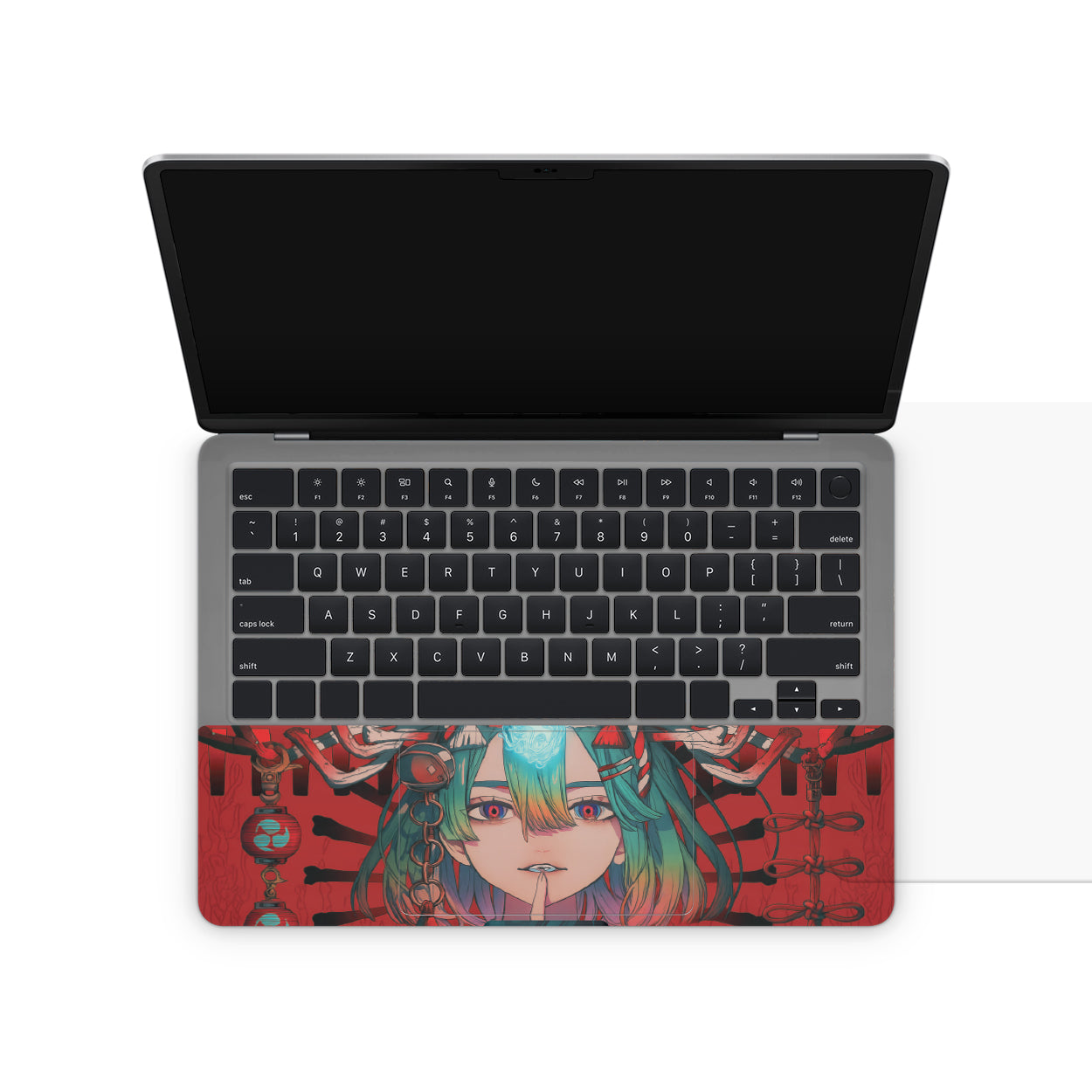 Laptop skin with anime girl design on keyboard