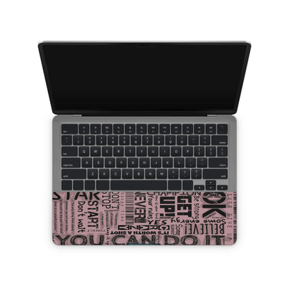 laptop skin with pink motivational quotes on touchpad area