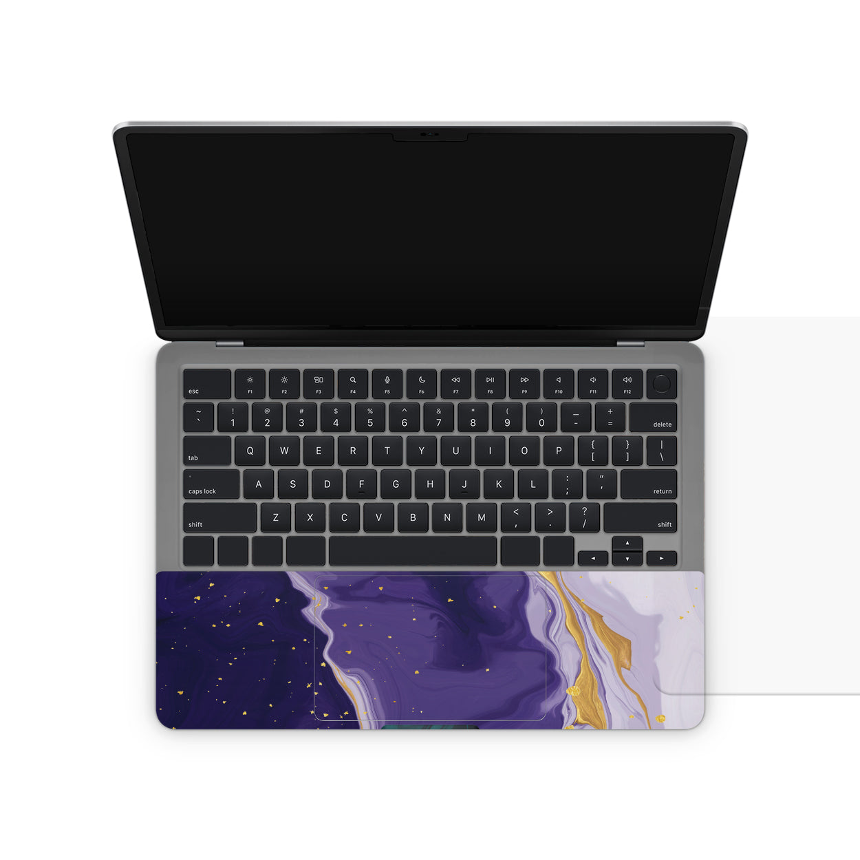laptop skin with purple golden design on touchpad area